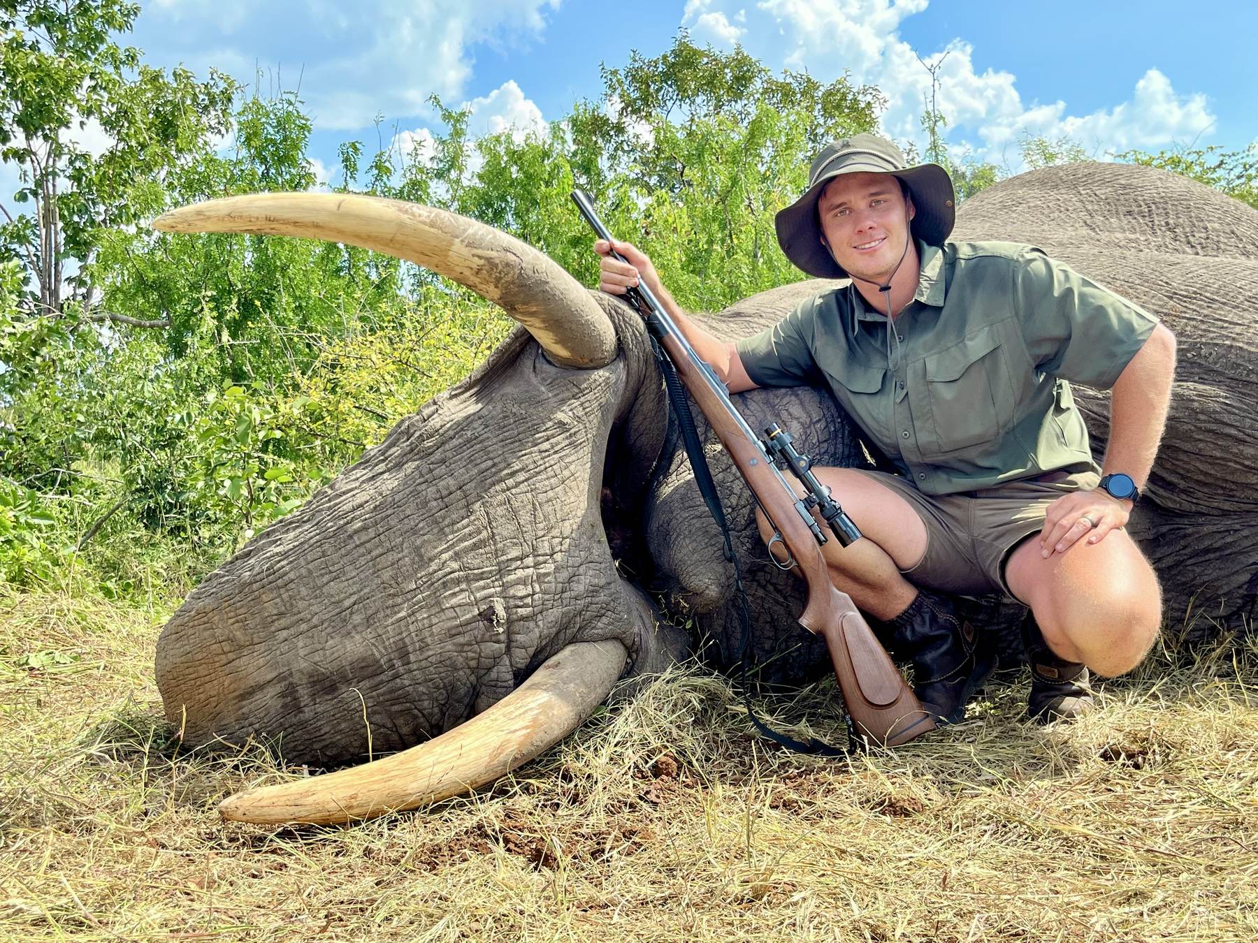 Hunting client with a bull elephant taken on the Zimbabwe leg of a combination safari