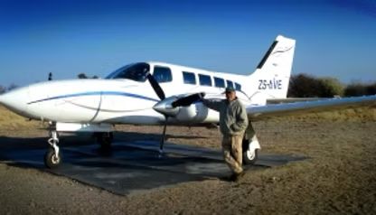 Charter aircraft waiting on a bush airstrip at the start of a Nhoro Safaris hunt