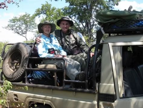 Nhoro Safaris clients in the back of the hunting vehicle in the Zimbabwe bush