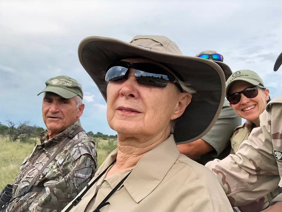 Nhoro Safaris clients in the hunting vehicle on the way out to the bait