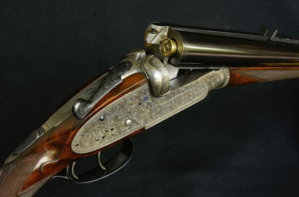 Close detail of an engraved double rifle action, the classic dangerous game rifle