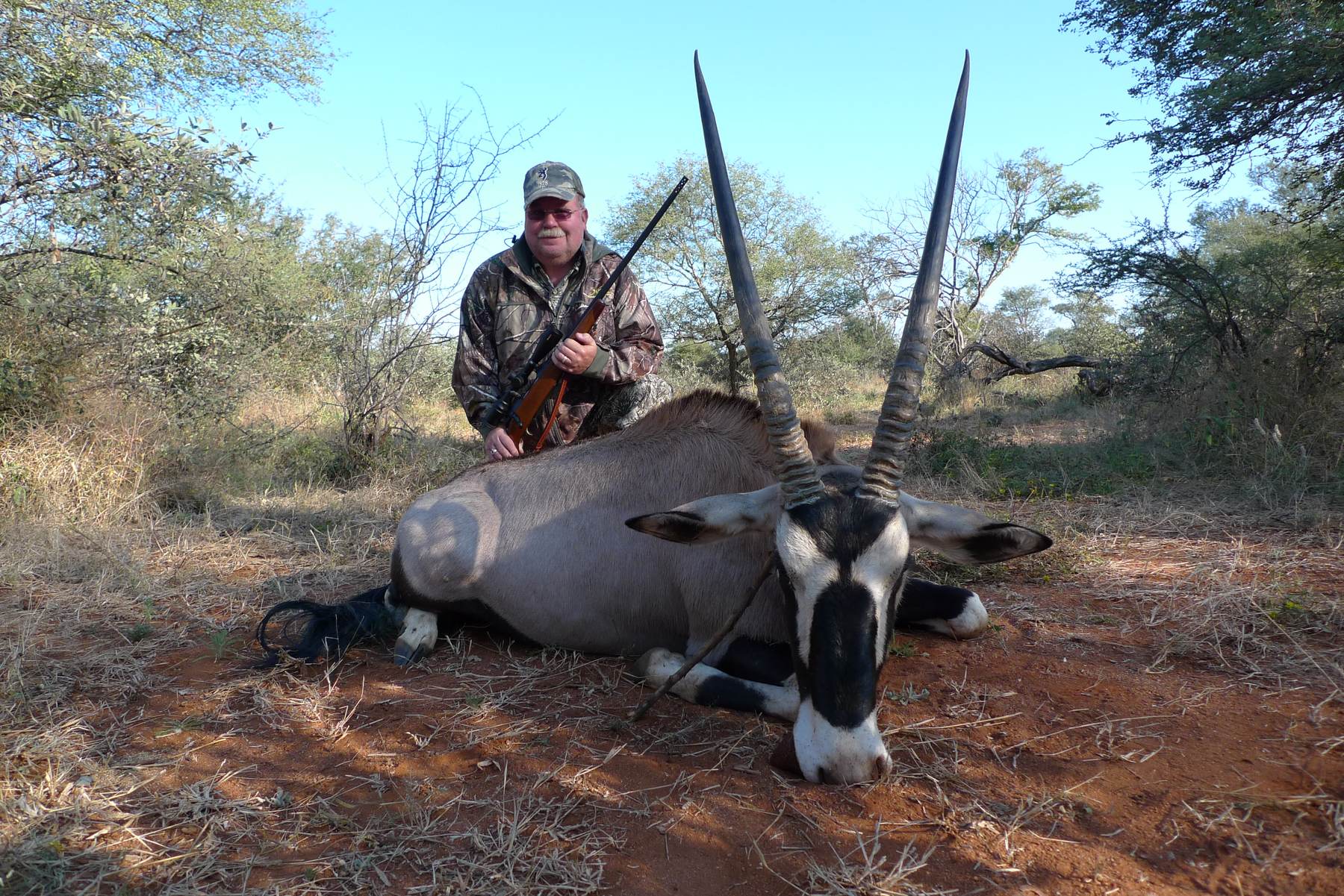 Hunter with a long-horned gemsbok taken in Limpopo, South Africa
