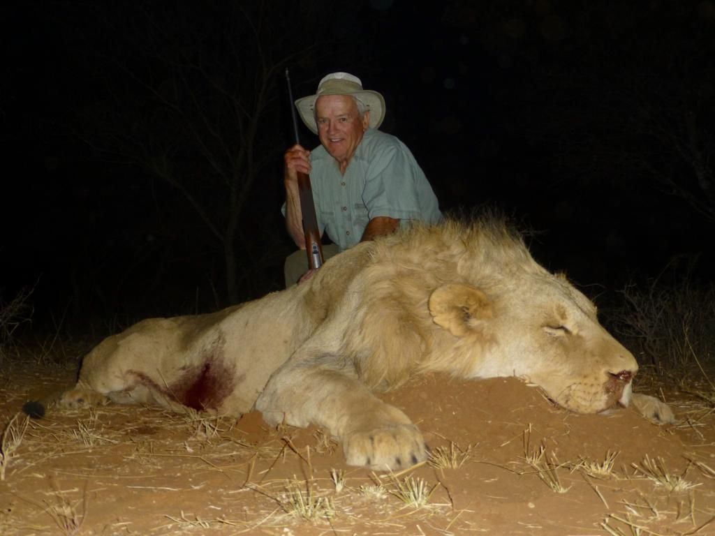 Hunting client with a mature male lion taken at night
