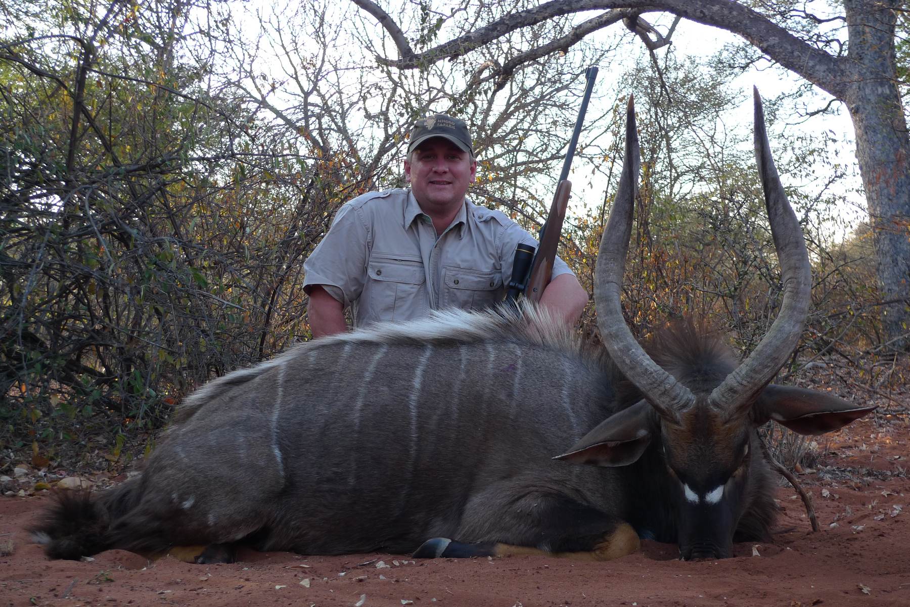 Hunting client with a heavy-caped nyala bull taken in Limpopo, South Africa