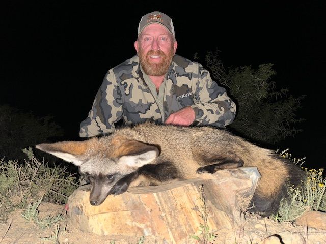 Hunting client with a bat-eared fox taken in Limpopo, South Africa