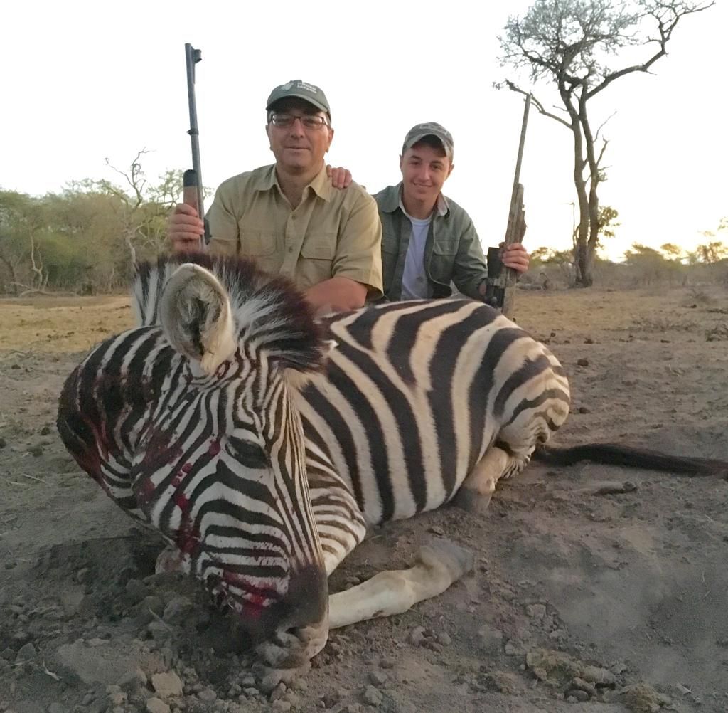 Two hunting clients with a Burchell's zebra taken in Limpopo, South Africa